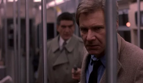 Andreas Katsulas (background) and Harrison Ford in The Fugitive (Photo: Warner Bros.)