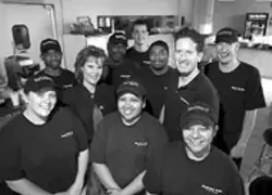 RADOK ATTA GRILL - Dawn and Mark C. White, owners and operators, - surrounded  by their staff.