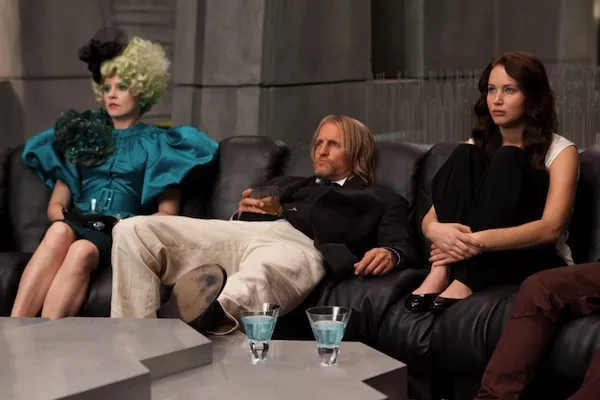 Elizabeth Banks, Woody Harrelson and Jennifer Lawrence in The Hunger Games (Photo: Murray Close / Lionsgate)