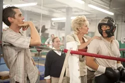 PARAMOUNT - IN THE CLEARING STANDS A BOXER: Christian Bale, Melissa Leo and Mark Wahlberg in The Fighter