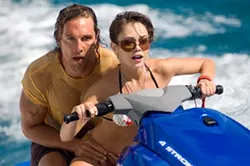 VINCE VALITUTTI / WARNER BROS. - MAKING WAVES: Finn (Matthew McConaughey) and Gemma (Alexis Dziena) give pursuit in Fool's Gold.