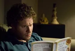 SUZANNE HANOVER / UNIVERSAL - MY FIRST READER Ben Stone (Seth Rogen) gets familiar with baby talk in Knocked Up