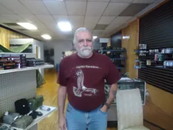 PAT MORAN - Ralph Broome inside his Carolina Preppers and Survivors Store