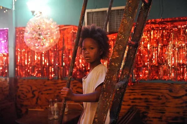 RED LIGHT DISTRICT: Hushpuppy (Quvenzhan&eacute; Wallis) searches for her mother in a house of ill-repute in Beasts of the Southern Wild. (Photo: Fox Searchlight)