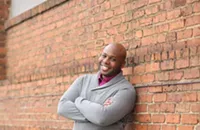 Reginald Bell Jr. is coaching from the couch