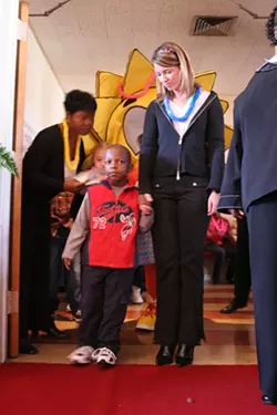 Some children have an adult walk with them for support - CATALINA KULCZAR