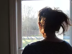 Emily, a victim of sexual assault and the subject of an episode of 'She Says,' in her home in 2017. (Photo by Ryan Pitkin)