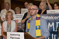 Rev. Ben Boswell speaks at the recent vigil at Myers Park Baptist Church. (Photos by Mackenzie Harris)