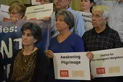 Local immigration lawyer Cynthia Aziz (left) also spoke at the vigil.