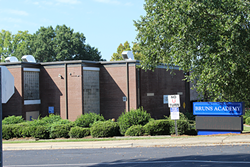 Bruns Academy in the Seversville neighborhood is one of the schools on the ‘Breaking the Link’ report’s “high poverty” lists that also tested positive for dangerous levels of water contaminants. - (Photo by Courtney Mihocik)