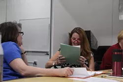 Lane Morris (right) cuts up with Josephine Hall during rehearsal for 'Confidence.'