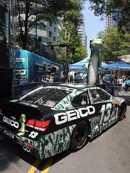 The GEICO Gecko watches over all at Speed Street. (Photo by Ryan Pitkin)