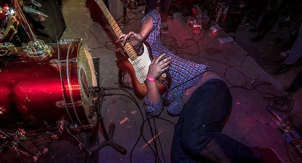 Erik Button gets into his feels on stage. - BOBBY WHITMIRE