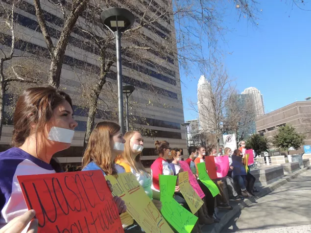 Students with Campus Pride protest the recent action of city leaders and inaction of state leaders on Dec. 22 in Charlotte. (Photo by Ryan Pitkin)