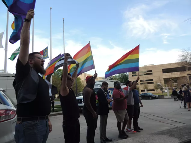 More than 100 people gathered in front of the Charlotte-Mecklenburg Government Center on March 24 to protest the passing of HB2. (Photo by Ryan Pitkin)