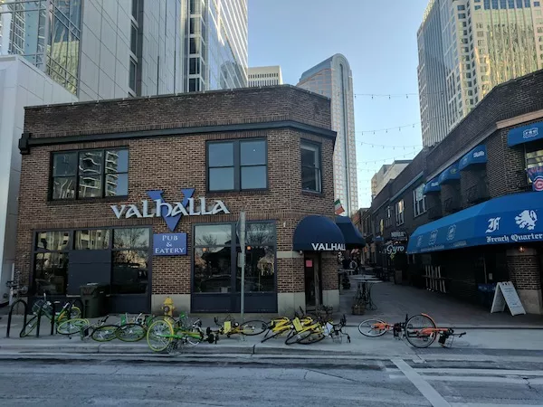 Dockless bikes sprawled in front of Latta Arcade.