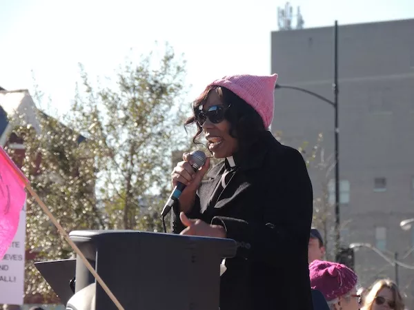 Rev. Amantha Barbee speaks to the crowd at the Women's March in First Ward Park. (Photo by Ryan Pitkin)