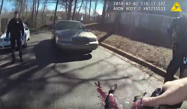A still shot from the body cam footage of Officer Dunn, who arrived after the shooting and took command of the crime scene.