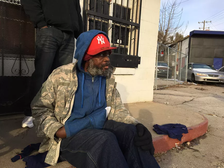 James Delford tries to stay warm in extreme weather