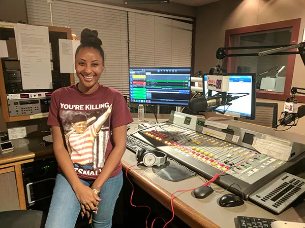 Ya Girl Nikki in the studio at Power 98, where she'll be collecting books in the coming months. (Photo by Ryan Pitkin)