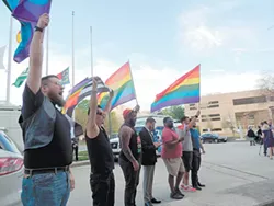 More than 100 people gathered in front of the Charlotte-Mecklenburg Government Center on March 24 to protest the passing of HB2. (Photo by Ryan Pitkin)